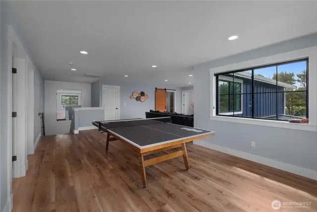 Rec area next to the upper living area. Entertain on both levels for large groups!