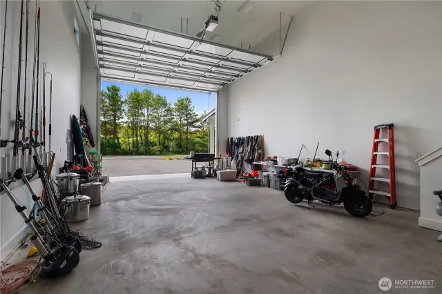 Lots of shop space 24'x60'. Door size is 14' tall and 20' wide. Ceilings are 20' high. Has a Twin Hybrid Hot water tanks for hot water that will not run out. Outside faucets have hot water and high pressure from a 1' main water line.