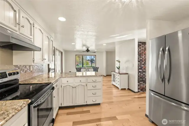 Kitchen with view of sitting area or potential dining area