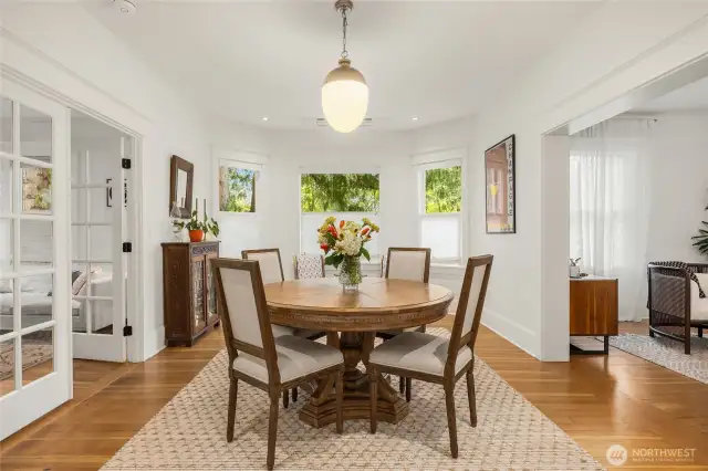 The spacious dining room features a bay window for extra space.