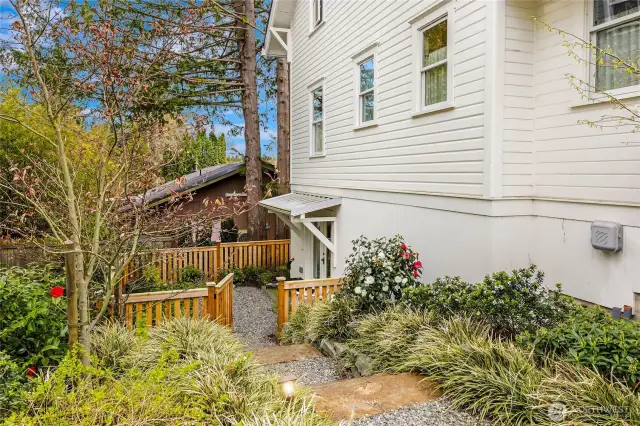 The entry to the lower area also features a newly fenced area for more privacy.