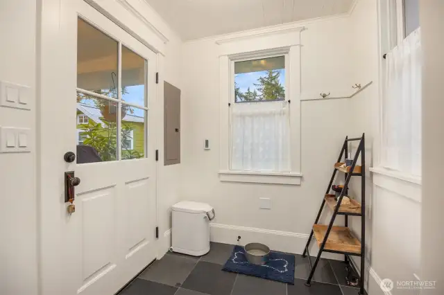 Mudroom at the side entry has slate floor with in-floor heating.