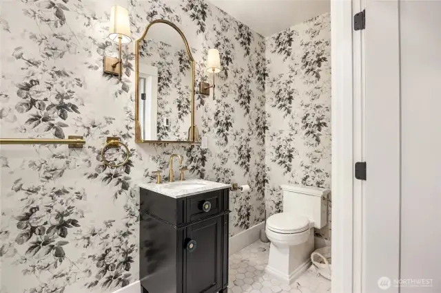 Newly installed bathroom features marble floors with in-floor heating and a curb-less walk-in shower.