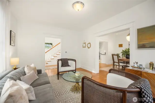 The main living room off the entry flows nicely to the dining area.