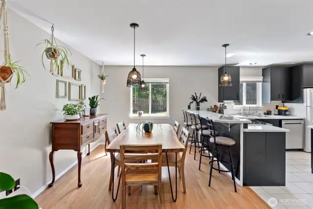 Spacious dining room with pendant lights