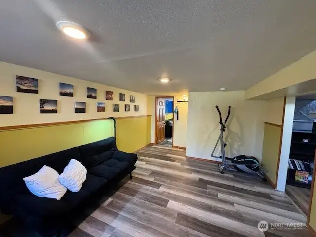 The lower level boasts a large open room which could be a media room, rec room, or office space.