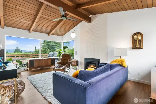 Prepare to have your breath taken away once inside!  Soaring vaulted wood ceilings and GIANT windows.