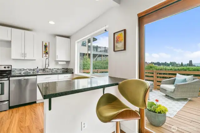 Kitchen with granite counters and new dishwasher & fridge!