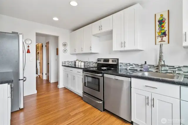 Lots of cabinets and counter space here