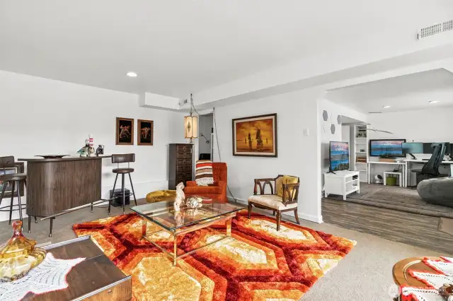 Living room opens up into bonus room which could be a dining room/kitchen/play room?!  Great open space!