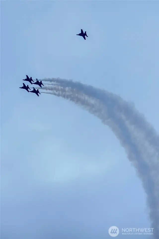 Photos of Blue Angels taken from rooftop deck on July 31, 2025.