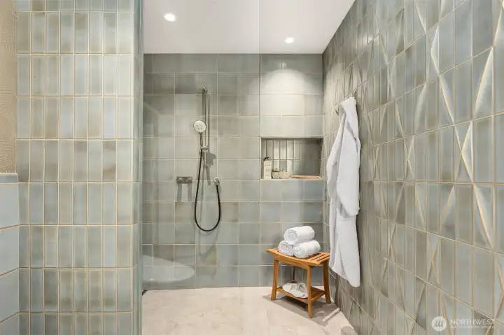 Casamance wallpaper + Gessi shower hardware.