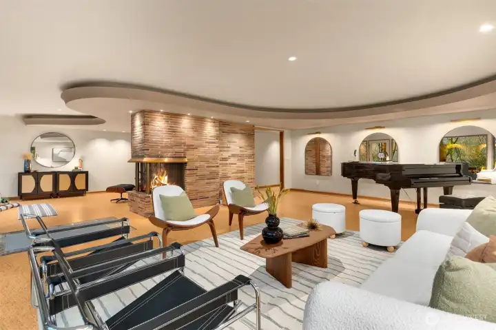 Moody cove ceilings enhance the lower-level vibe.