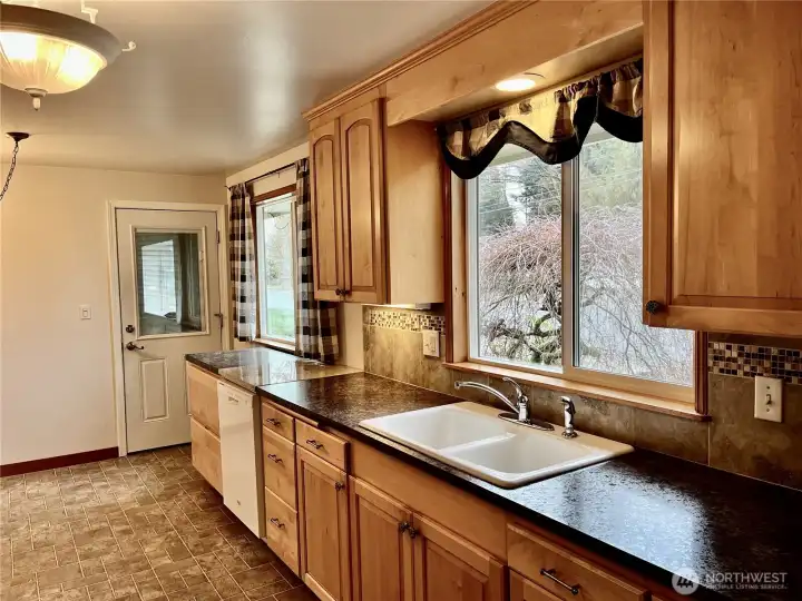 access to large utility room/office and garage