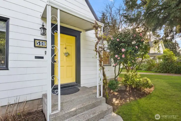 There is nothing like a Craftsman Home with a Charming Front Door and a matured Climbing Hydrangea!