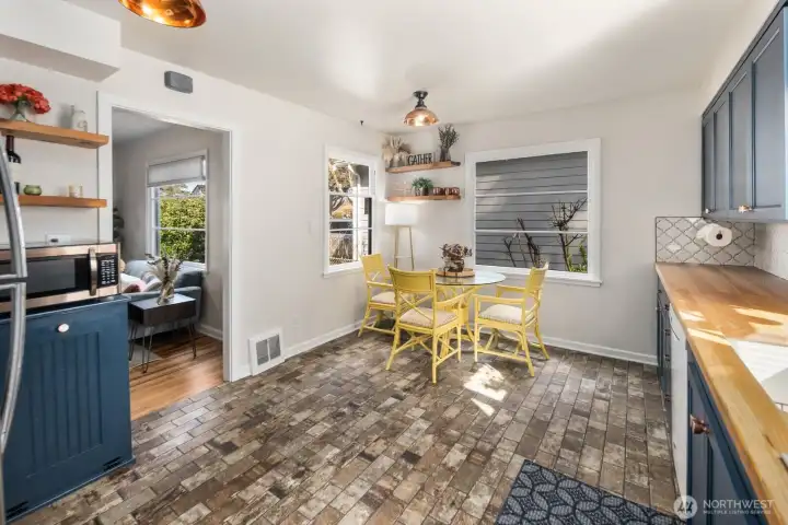 The kitchen and living areas flow in a way that feels natural and connected, making everyday living and entertaining effortless.