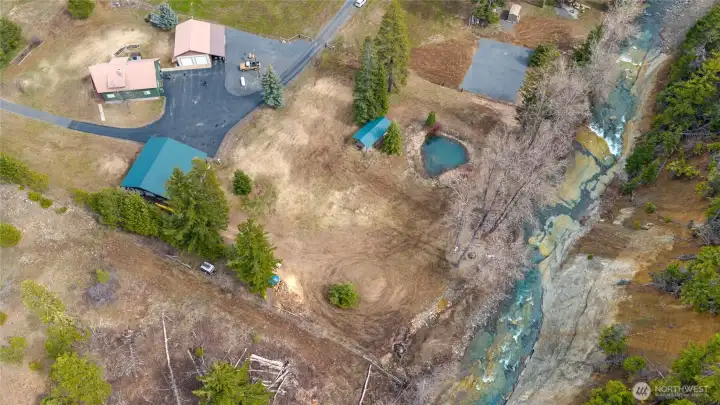 Aerial view of all buildings on property which include another 14'x30' covered carport.