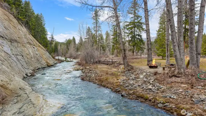 Crystal clear Teanaway River flows through the backyard.