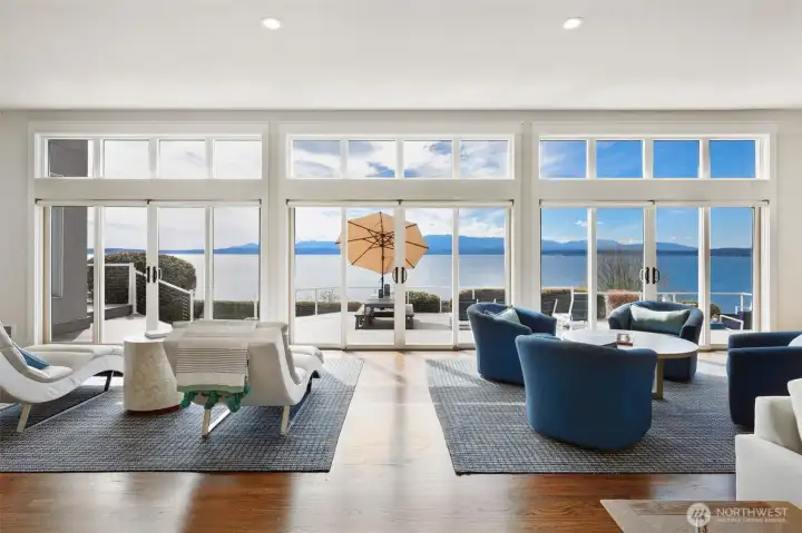 Looking out upon a vast deck with Sound views.