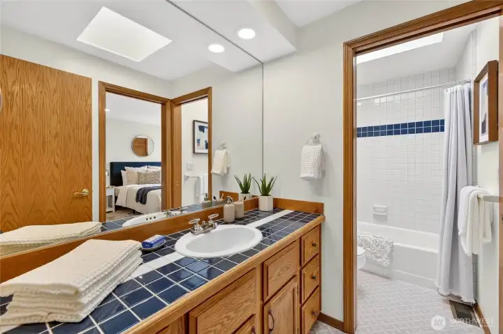 Upper level full bathroom. Easy "jack-and-Jill" sytle; connected to two bedrooms.