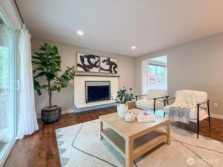 Large living room with cozy wood fireplace