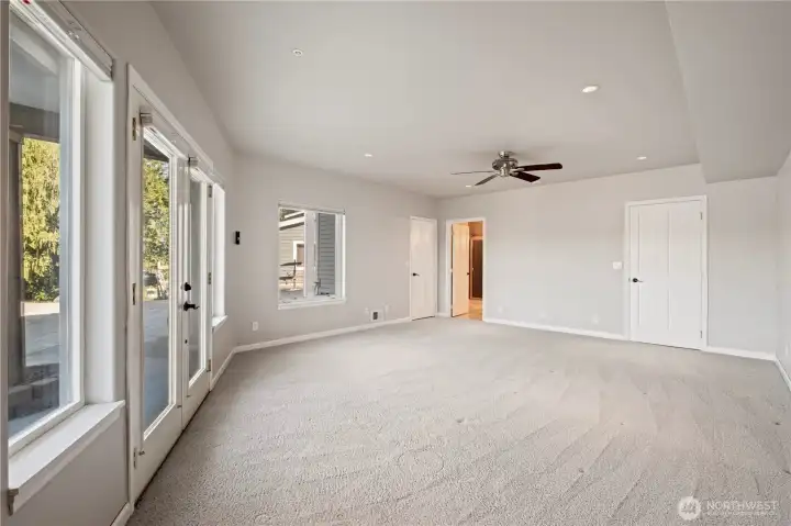 2nd primary suite offers a walk-in closet and private access to the large downstairs bathroom with shower.