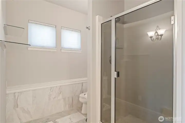 Downstairs bathroom with shower.