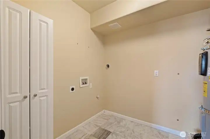 2nd full laundry room located downstairs.