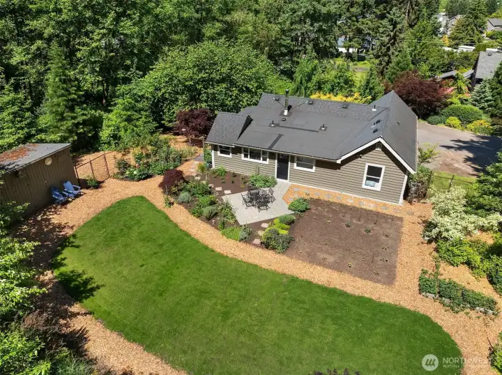 Fully Fenced Backyard, large Grass Area, Vegetable Gardens, Fruit Trees, Perennial Gardens
