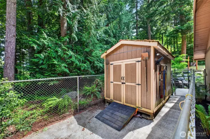 Mower shed and dog run Mower shed and dog run