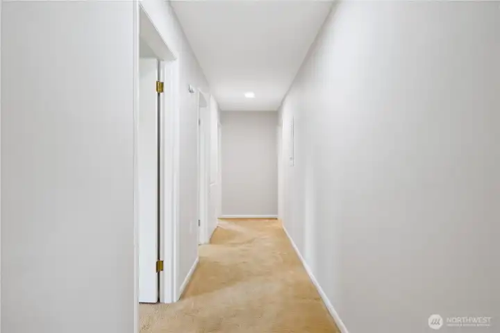 Wide hallway to bedrooms