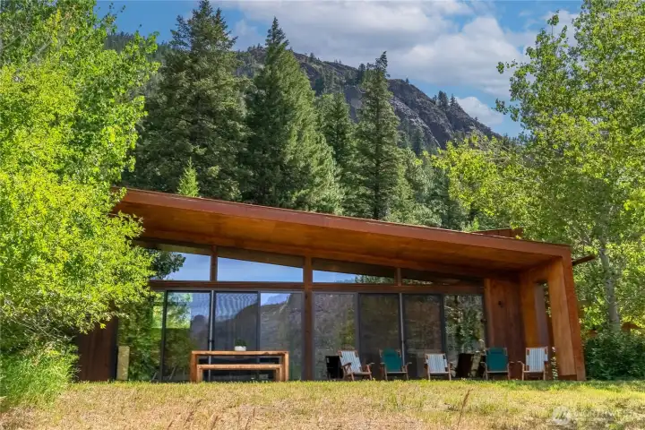 The home sits at the base of Goat Wall and is within walking distance of some of Mazama's best hikes. The home sits at the base of Goat Wall and is within walking distance of some of Mazama's best hikes.