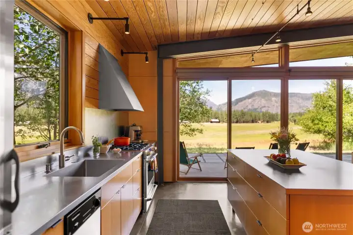 The kitchen is perfectly outfitted for cooking and hosting. The kitchen is perfectly outfitted for cooking and hosting.