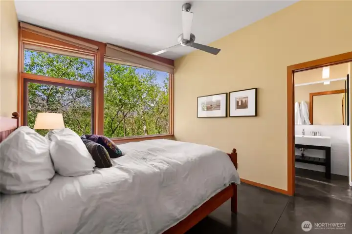 Each bedroom has its own full bath accessible by a sliding pocket door. Each bedroom has its own full bath accessible by a sliding pocket door.