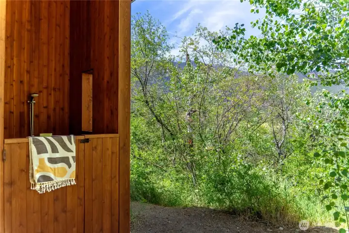 The private backyard has an outdoor shower with its own remarkable views of the surrounding landscape. The private backyard has an outdoor shower with its own remarkable views of the surrounding landscape.