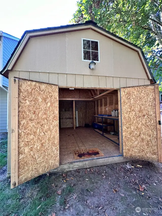 Roomy electrified shed ready for any use.