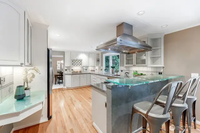 Kitchen eating bar with custom glass countertop