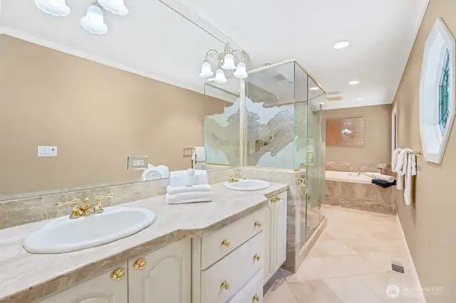 Primary bath with double vanity, seperate double headed shower, oversized jetted tub and heated floors