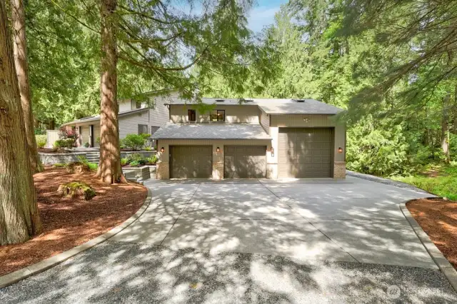 Detached 3 car garage with shop and a game room above the garage
