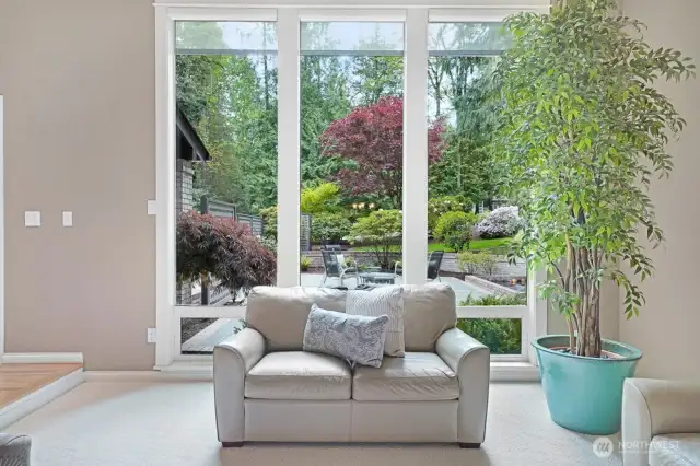Beautiful view from the living room  windows of the circulating and lighted water featured and front patio