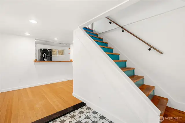 From lower level entry, access the main floor bedrooms
