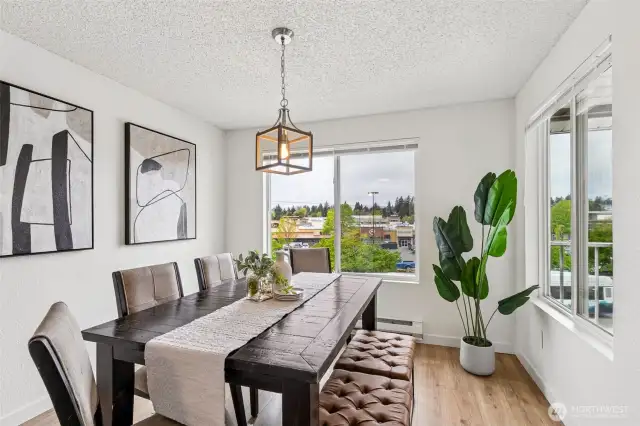 Dining area surrounded by windows