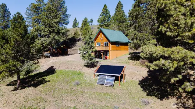Tranquil off-grid retreat offers secluded serenity and stunning views.