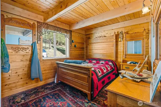Main bedroom, creates a warm inviting and rustic feel.