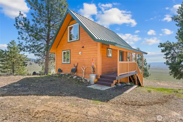 Spacious pull-through drive and ample parking for multiple vehicles.