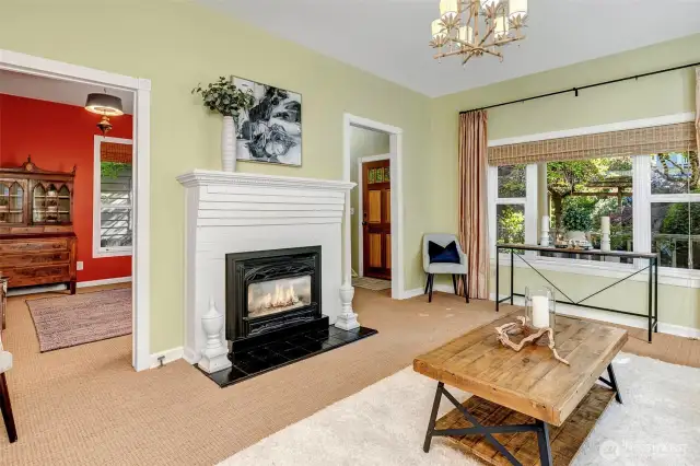 Living room has a gas fireplace.