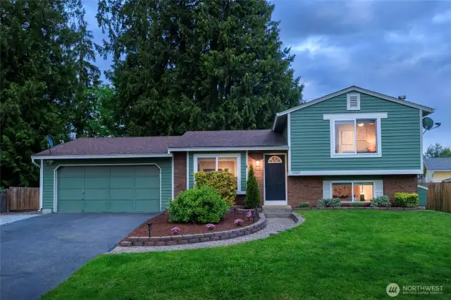 Welcome to this warm & inviting remodeled home nestled on a shy 1/4 acre with serene privacy!