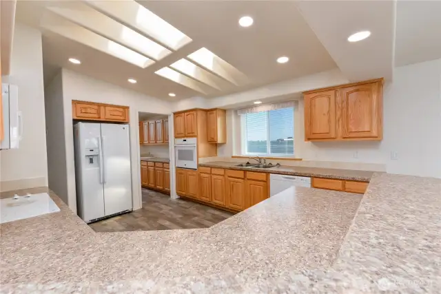 Kitchen over counter from dining area