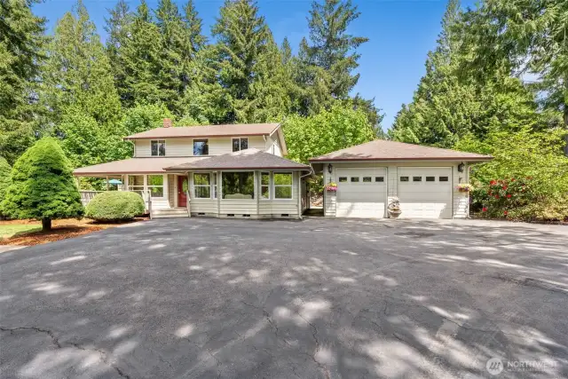 Front of home with detached garage