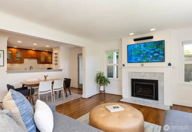 Gas fireplace and open to kitchen